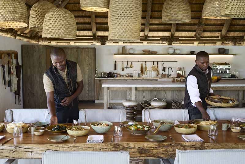 Chefs preparing dinner in the open kitchen at Lolelunga