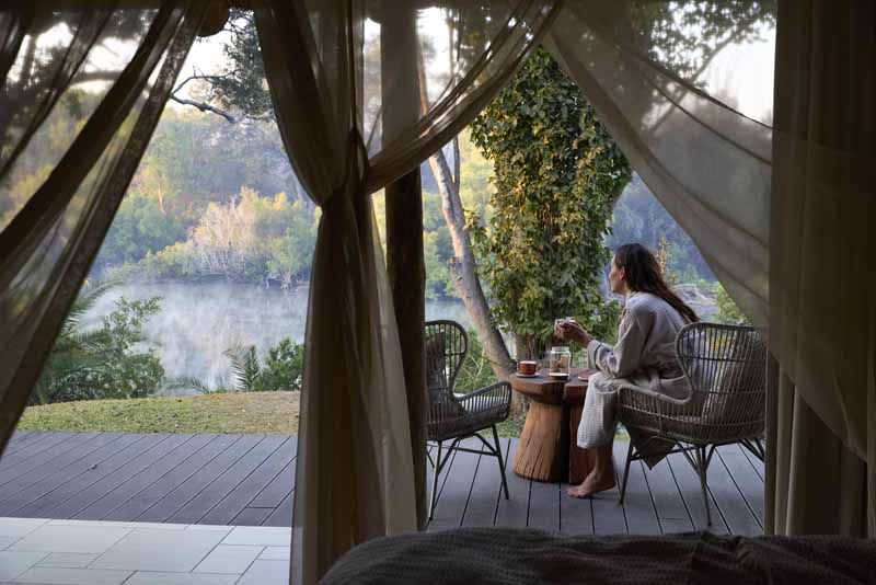 Morning coffee on a private suite deck at Lolelunga