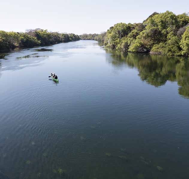 The clear waters of the Lunga River from above