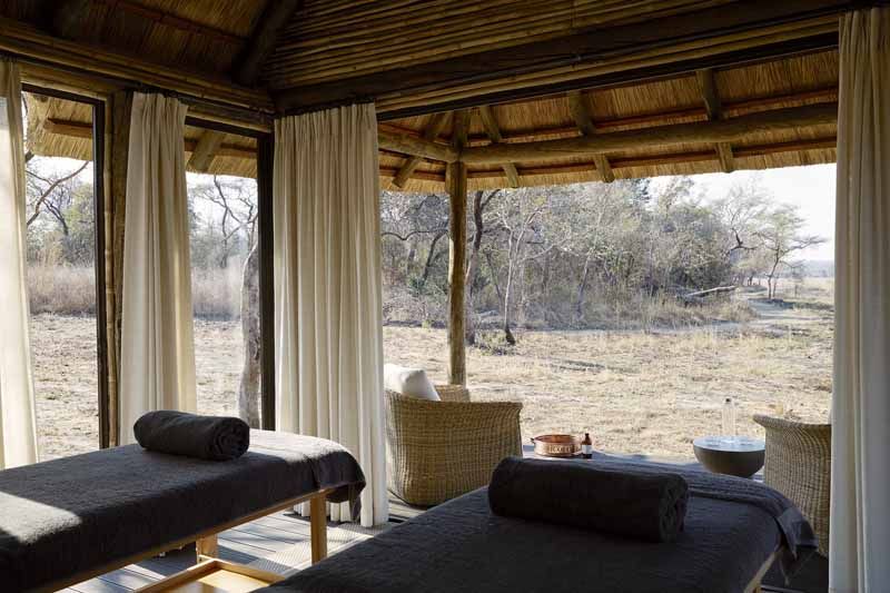 Treatment bed at the Lolelunga spa overlooking the bush