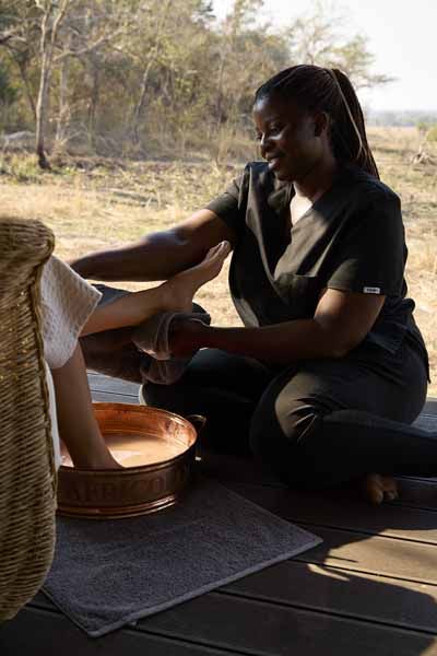 A welcome foot ritual at Lolelunga