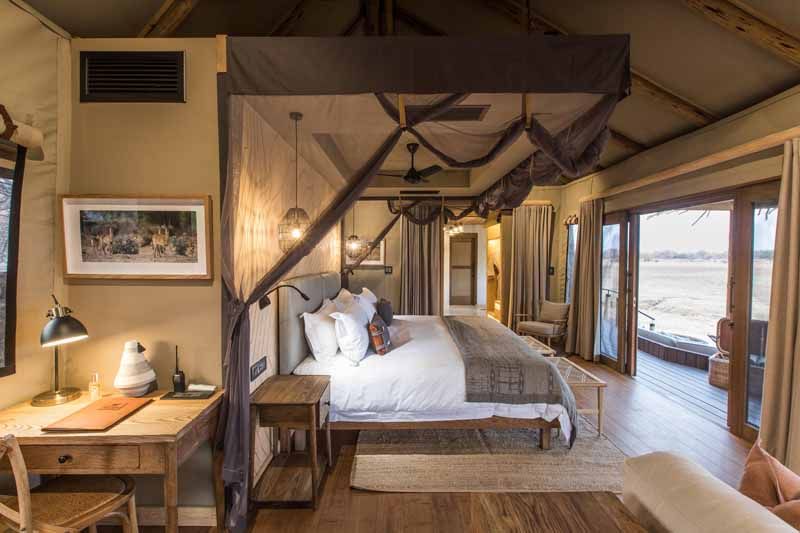 Interior of an elevated tented suite at Puku Ridge