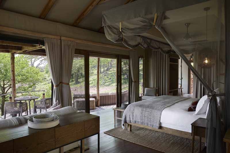 Super-king bed in a Puku Ridge tented suite
